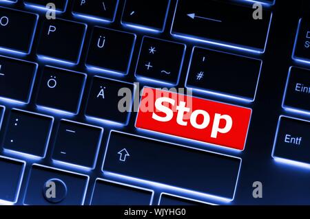 stop key on keyboard in red showing halt concept Stock Photo