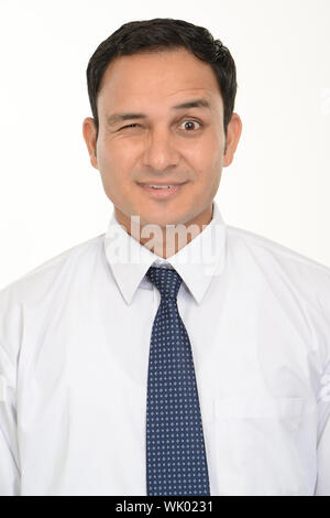 Close up of a businessman winking towards camera Stock Photo