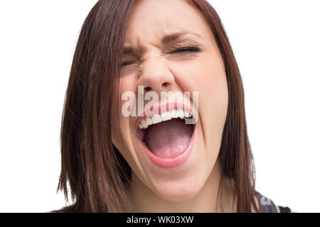 Close up on pretty brunette shouting Stock Photo