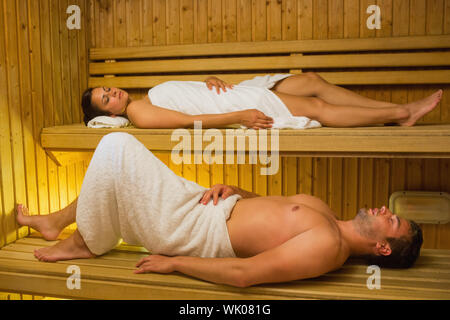 Calm couple relaxing in a sauna Stock Photo
