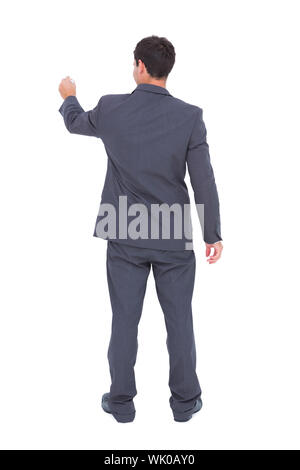 Rear View Of Businessman Drawing With Marker Infographs On Wall Stock 