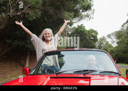 Mature couple having a ride together Stock Photo