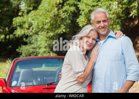 Cheerful mature couple posing Stock Photo