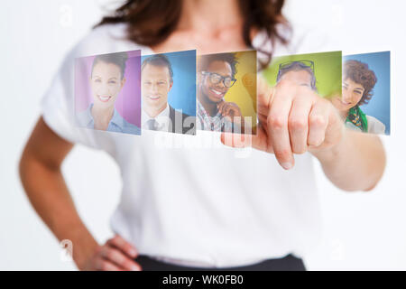 Elegant businesswoman selecting future employees Stock Photo