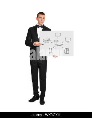 businessman in tuxedo holding poster with computer network Stock Photo