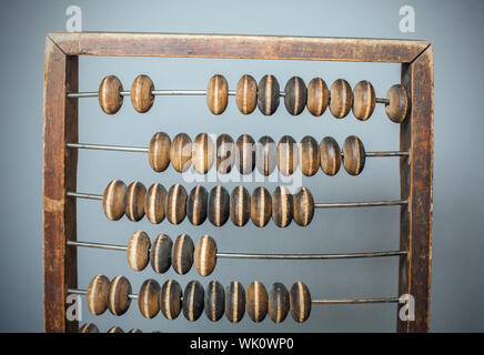 Accounting abacus on gray textured background with copy space Stock Photo