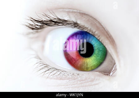 Female eye with rainbow multicolored iris close up Stock Photo