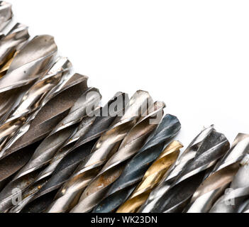 Various used twist drill bits in a row Stock Photo