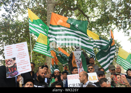 London, UK. 03rd Sep, 2019. A large crowd of protesters gather in Parliament Square around the statue of Gandhi as they wave flags in solidarity with the people of Kashmir after Indian Prime Minister Narendra Modi delivered an Independence Day speech to remove the special rights of Kashmir as an autonomous region. Credit: SOPA Images Limited/Alamy Live News Stock Photo