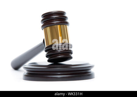 A wooden judge gavel and soundboard isolated on white background Stock Photo