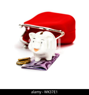Pink piggy bank and red purse over white Stock Photo