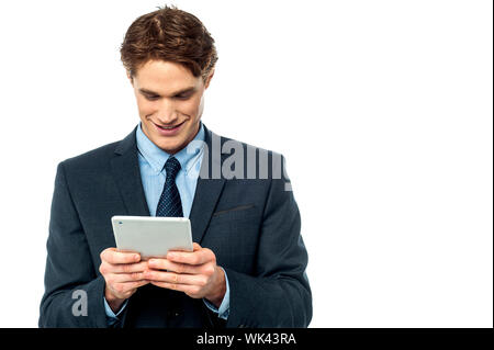 Young successful businessman with tablet device Stock Photo