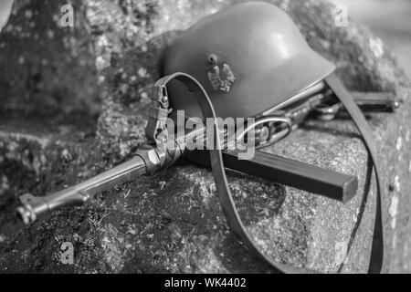Automatic machine gun and helmet SS officer. World War II. Stock Photo
