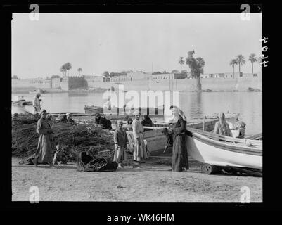 Iraq. (Mesopotamia). Baghdad. River scenes on the Tigris. Landing fuel from upstream Stock Photo