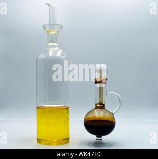 Seed oil and balsamic vinegar isolated on white background Stock Photo