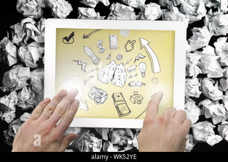 Composite image of hand touching tablet showing idea brainstorm Stock Photo
