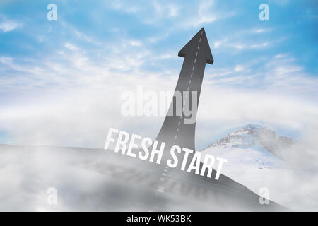 The word fresh start against road turning into arrow Stock Photo