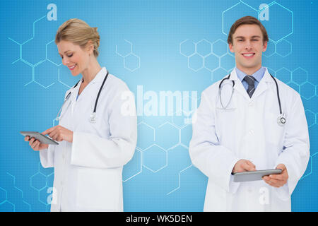 Composite image of medical team against chemical structure in blue and white Stock Photo