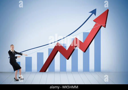 Businesswoman pulling a rope around arrow against blue bar chart with blue arrow Stock Photo