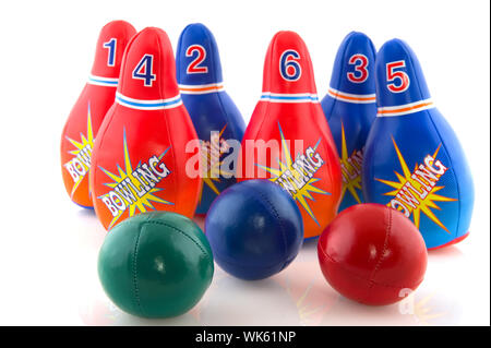 Bowling game with several pins and balls Stock Photo