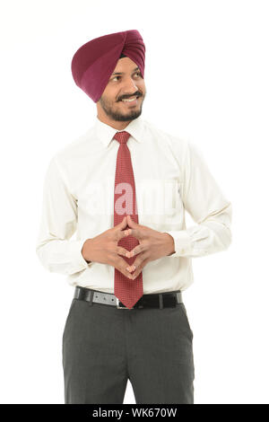 Indian businessman standing with hands joined Stock Photo