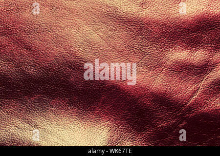 Genuine dark red leather background, pattern. High resolution photograph. Stock Photo