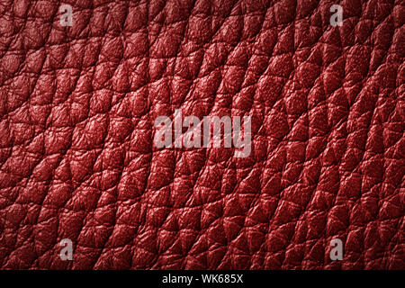 Genuine red leather background, pattern. High resolution photograph. Stock Photo