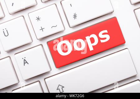 oops key on computer keyboard showing mistake concept Stock Photo