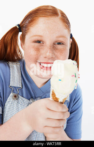 Overweight Child Eating Junk Food Stock Photo