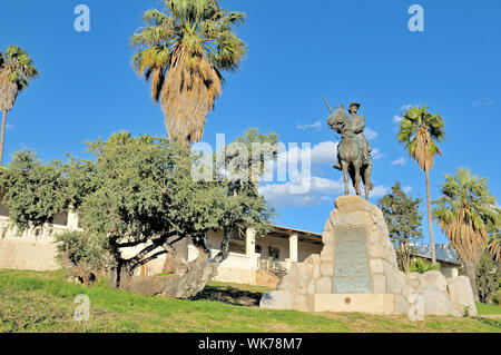 Equestrian rider statue and Alte Feste, oldest building in Windhoek,  Namibia Stock Photo