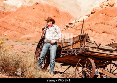 SOUTH WEST - A cowboy takes time to rest and reflect. Stock Photo