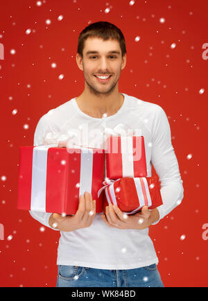 man holding many gift boxes Stock Photo