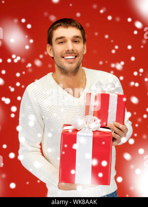 man holding many gift boxes Stock Photo