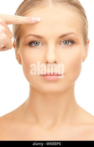 picture of beautiful woman pointing to forehead Stock Photo