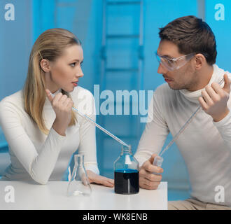 man and woman in laboratory Stock Photo