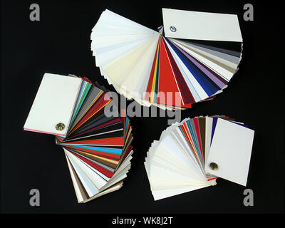 Colored samples of different papers on black background Stock Photo