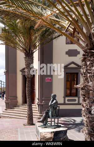 Statue of Manuel Velázquez Cabrera sitting on a chair outside Local government office Puerto del Rosario Fuerteventura Canary Islands Spain Stock Photo