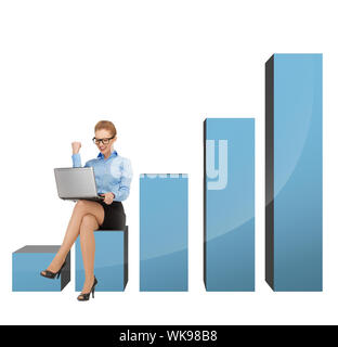 businesswoman sitting on big 3d chart with laptop Stock Photo