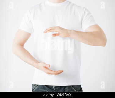 close up of mans hands showing something Stock Photo