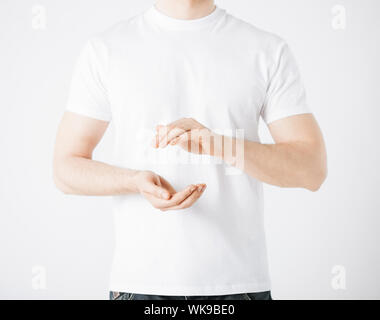 close up of mans hands showing something Stock Photo