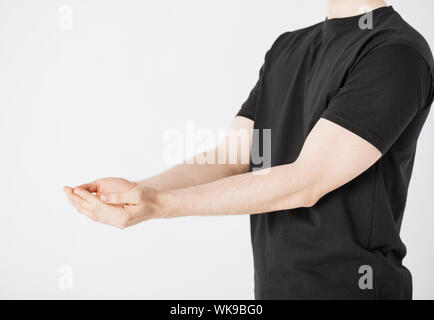 mans hands showing something Stock Photo