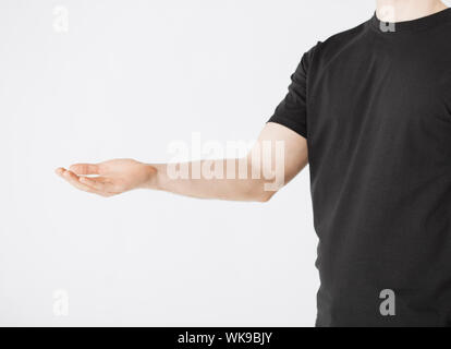 close up of mans hands showing something Stock Photo