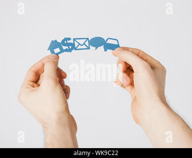 man hands showing paper symbols Stock Photo