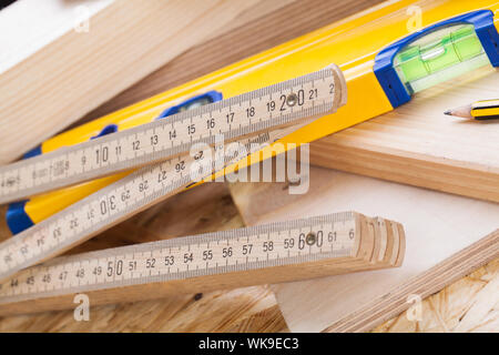 Carpenters level, ruler and right angle Stock Photo