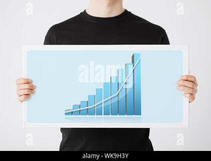 woman holding board with 3d graph Stock Photo