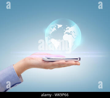 woman hand with sphere globe Stock Photo