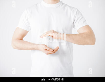 mans hands showing something Stock Photo