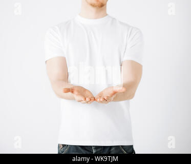 close up of mans hands showing something Stock Photo