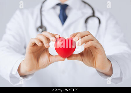 close up of man hands with heart Stock Photo