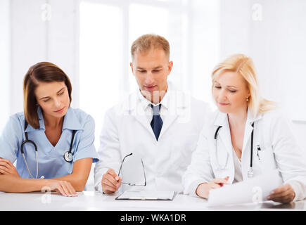 team or group of doctors on meeting Stock Photo